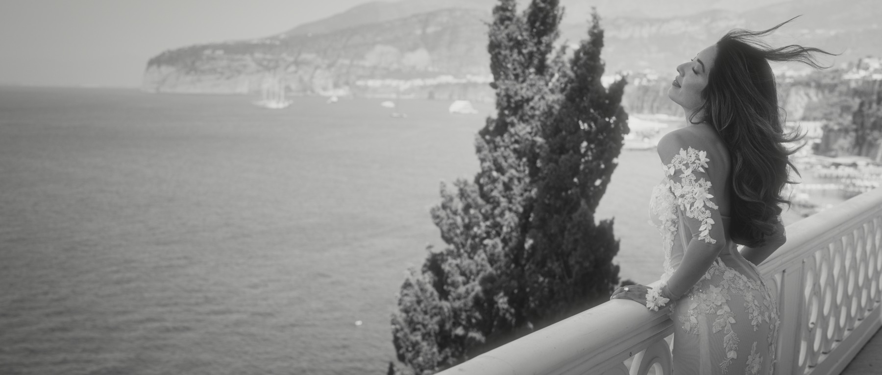 Morgan beside the sea in black and white