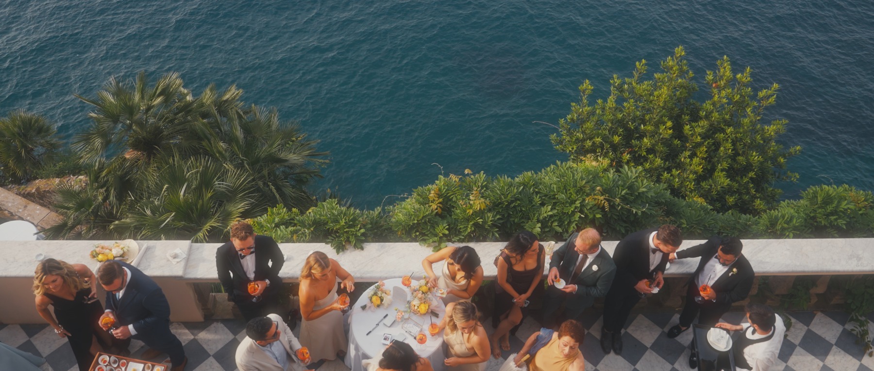 Guests gathered beside the sea