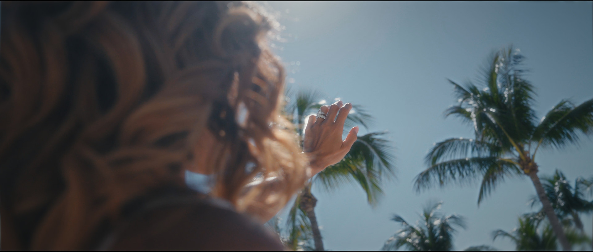 A hand reaching towards the palms